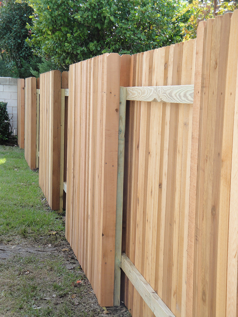 wood-fence-alternating-white-vertical-planks-side.jpg